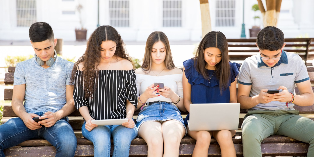 Kids Sitting on a Bench